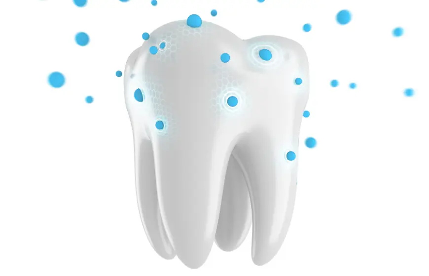 ilustracja przedstawia proces wzmacniania szkliwa zęba dzięki właściwościom ksylitolu